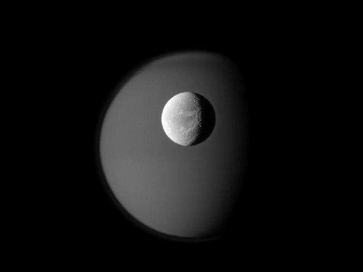 Moon Dionne in front of the lazy atmosphere of Moon Titan